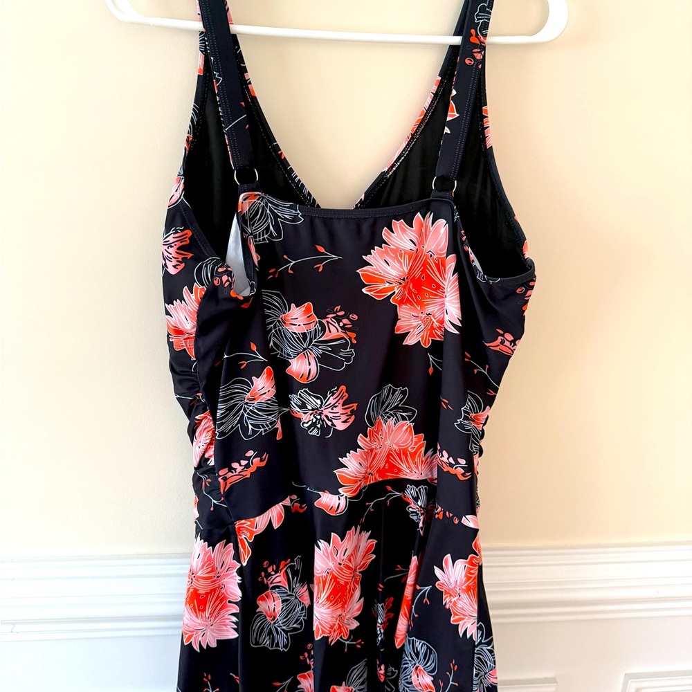 Summer Mae Inc. One piece bathing suit with skirt & shorts underneath.